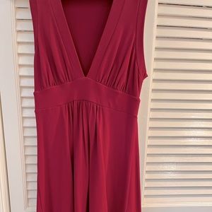 Red A-line sleeveless dress.